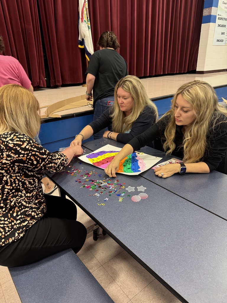 Cheat Lake Elementary service personnel hard at work on their Mascot Mania Challenge!