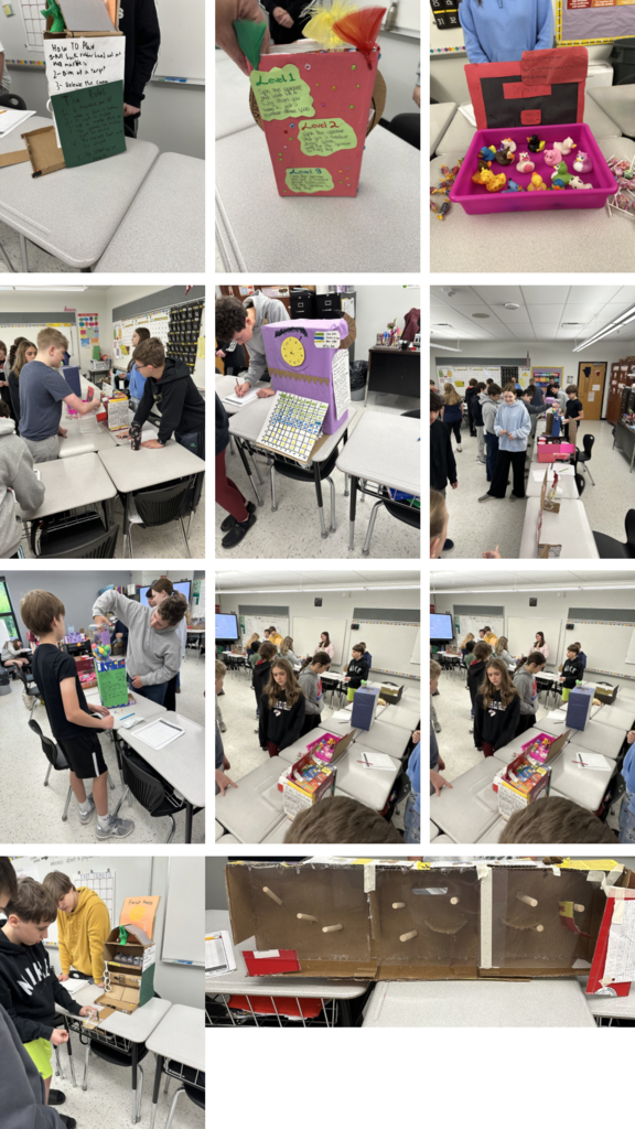 Twelve photos of Probability projects sitting on desks in a classroom.