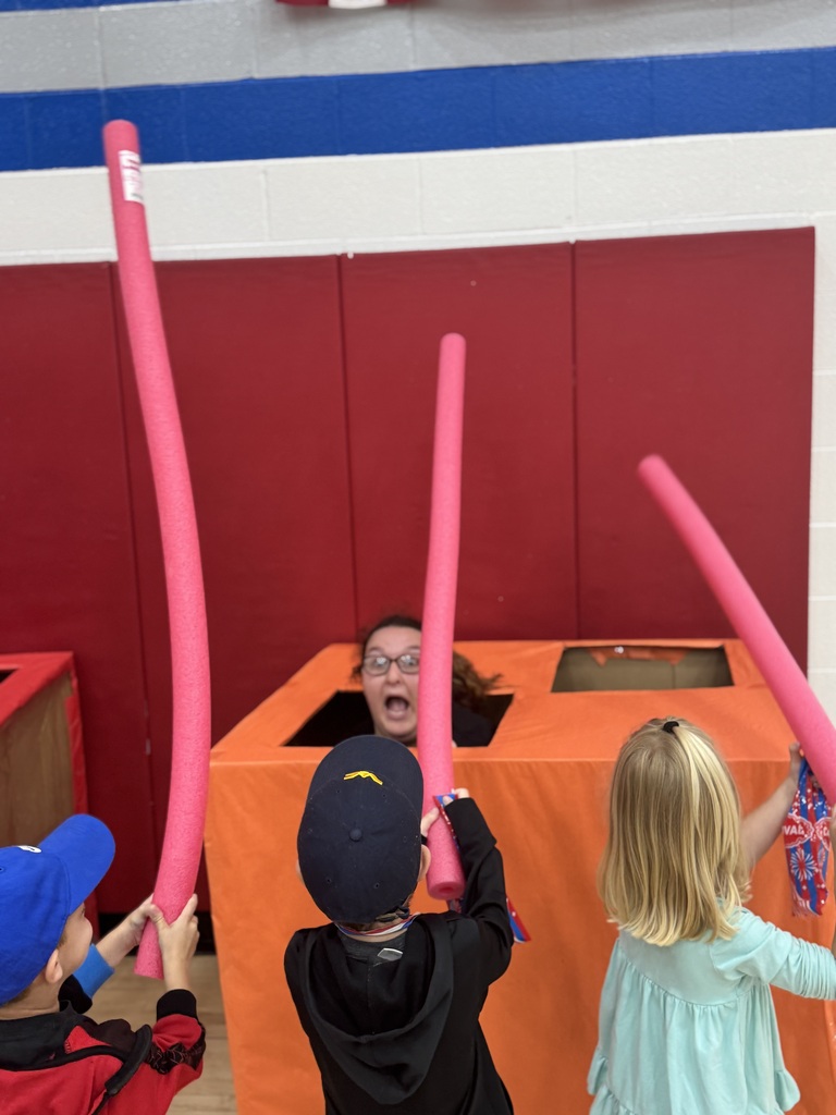 Pre K students playing "whack a teacher"