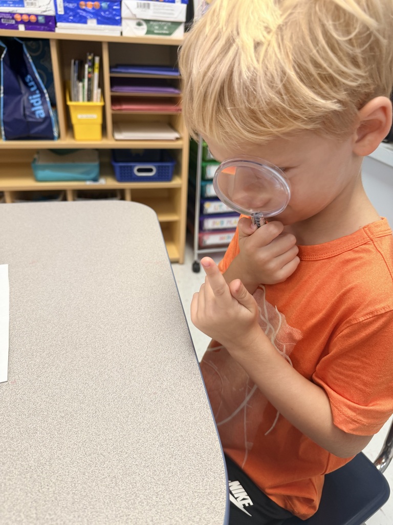 student studying finger prints