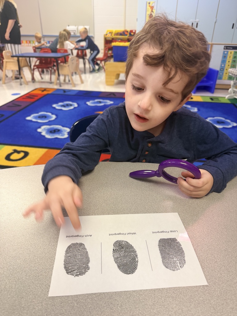 student studying finger prints