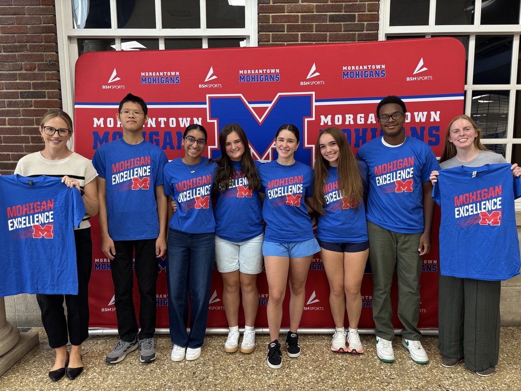 A group of people who are wearing the same tshirt