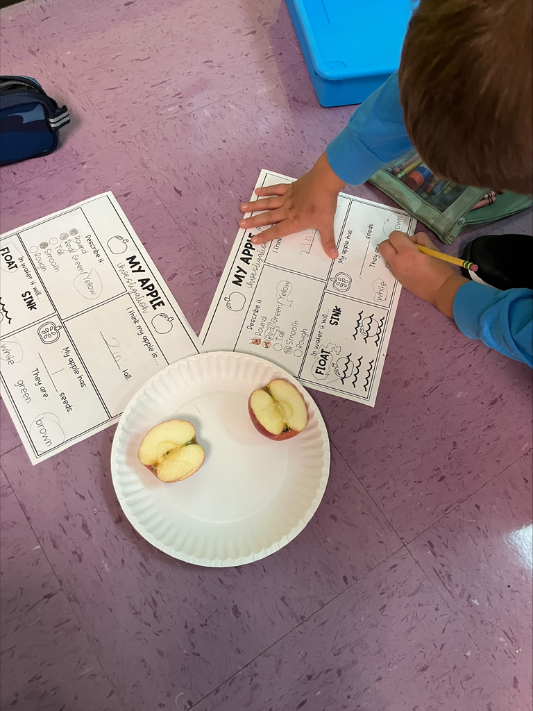 Students completing apple study
