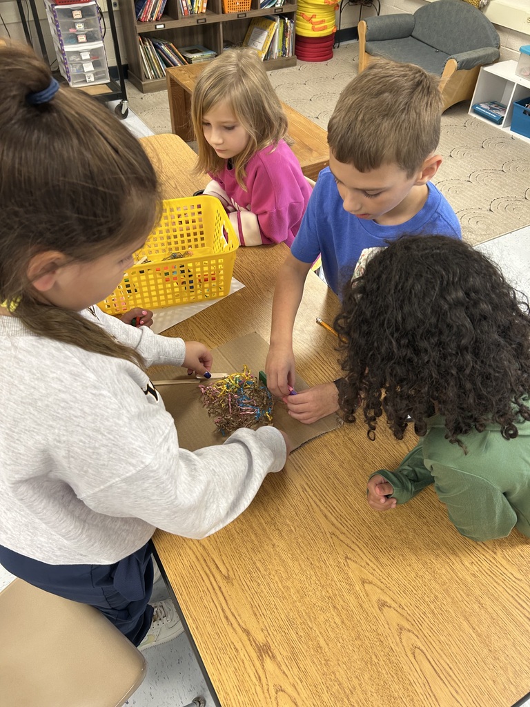 Students seeing if their structure is strong enough for wind
