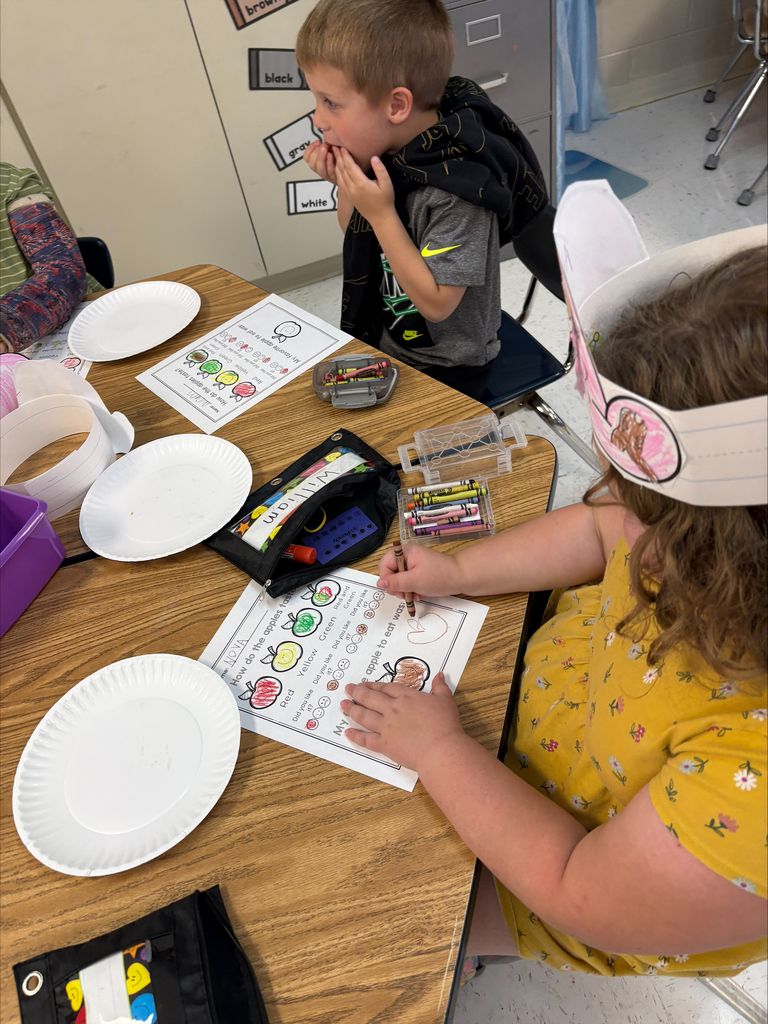 Kindergarten students tasting apples