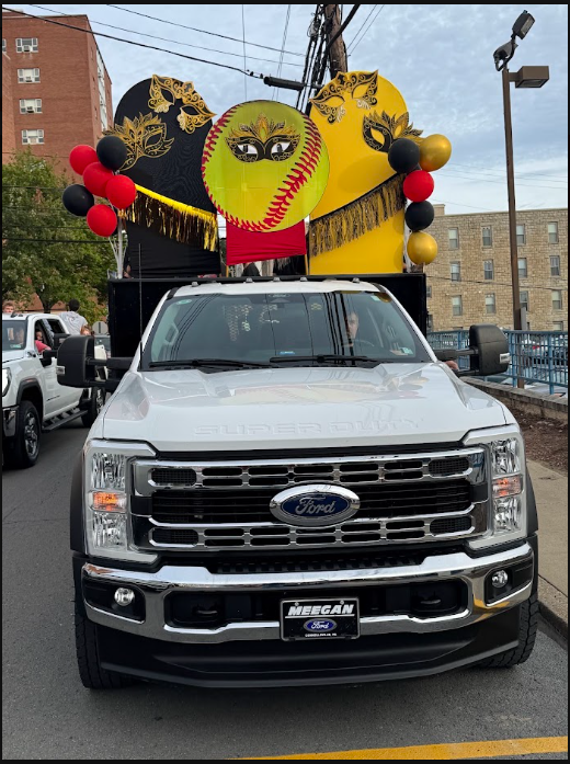 softball team in their homecoming float