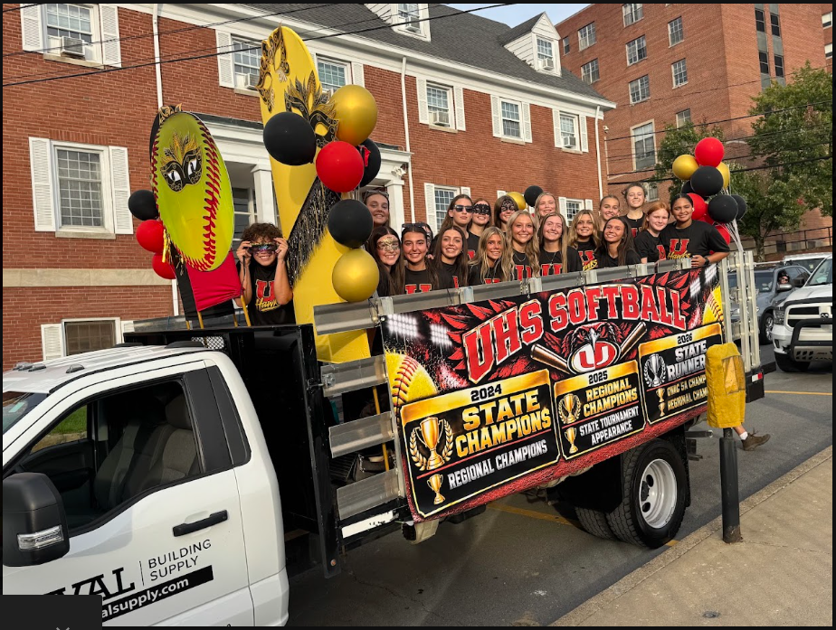 softball team in their homecoming float