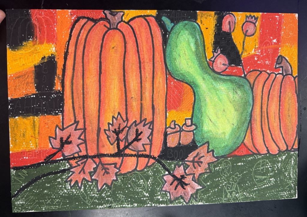 A piece of paper with an oil pastel painting on it. The painting has a branch of leaves, 2 pumpkins and a gourd on it.