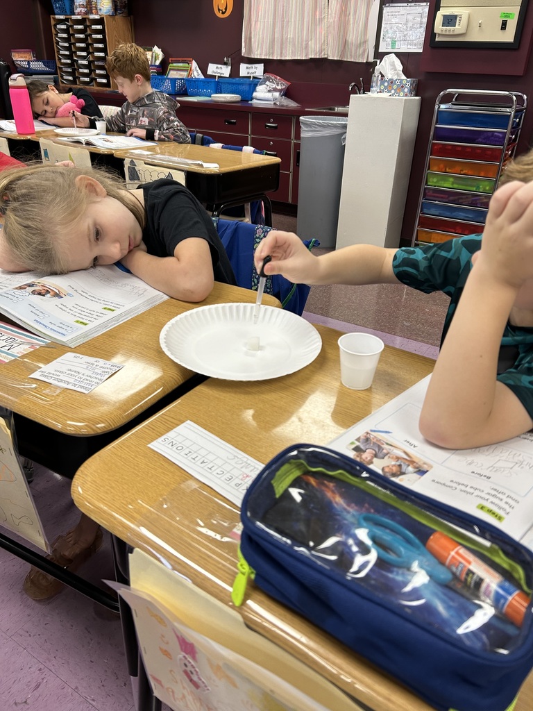 Students performing science experiments.