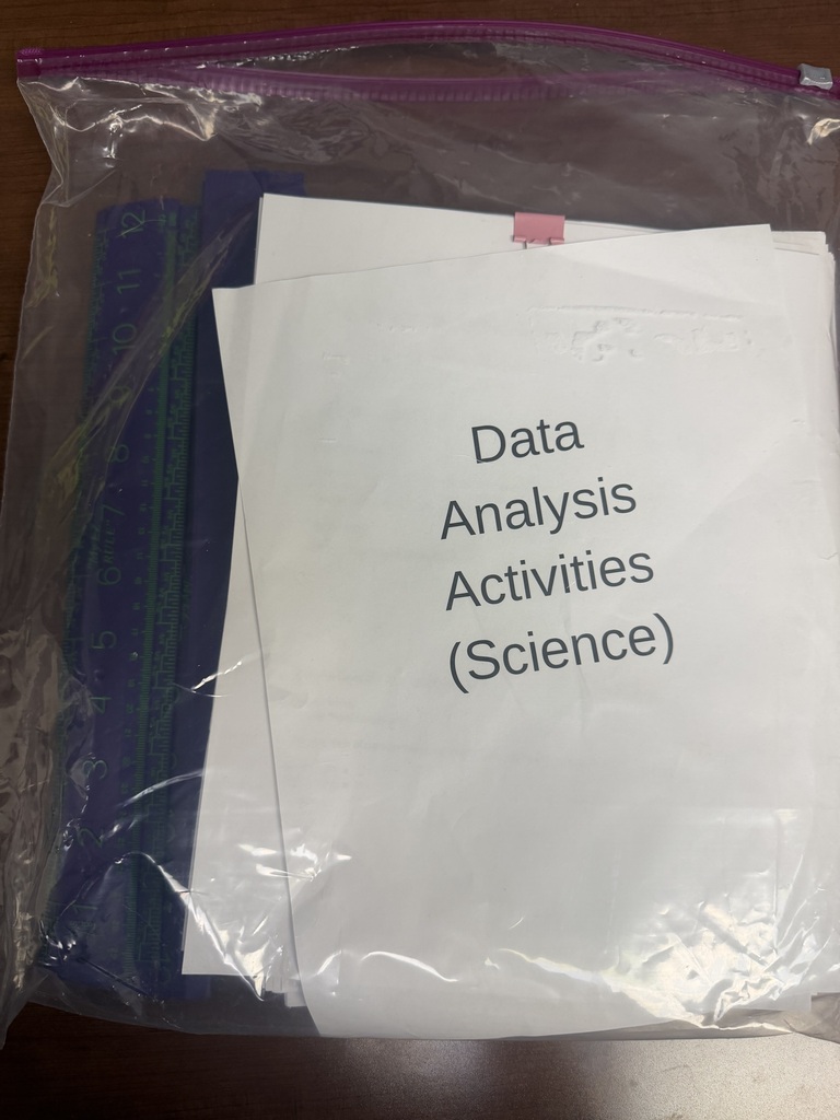 A photo of a plastic bag with a paper in it that says Data Analysis Activities (Science).