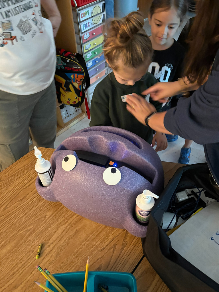 students getting a sticker