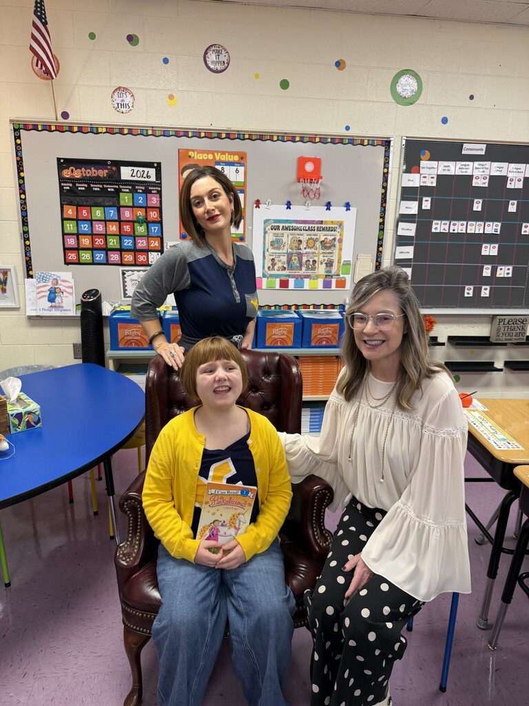 student with mom and principal