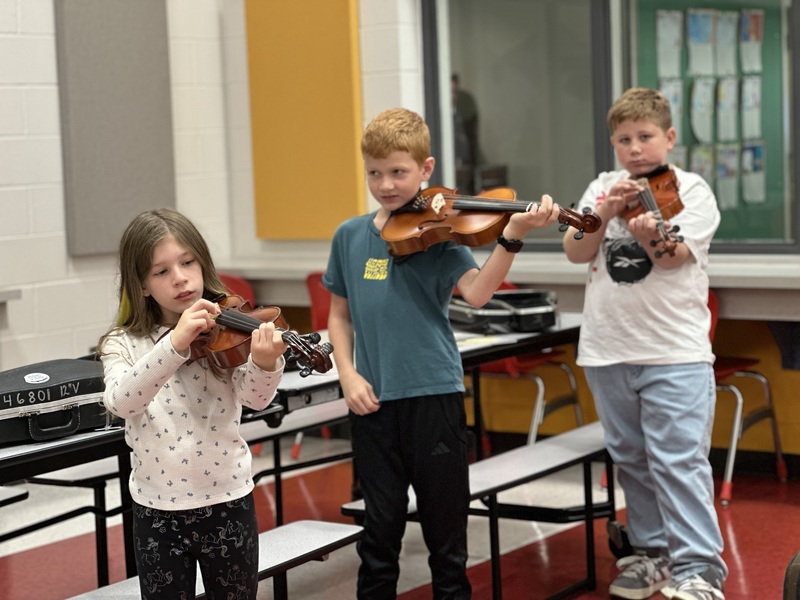 Strings students practice foundational skills!