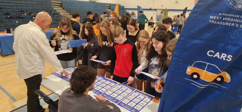 Students buying cars during the Get a Life program