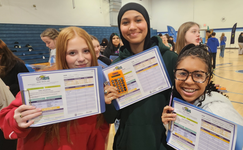 Students showing their career card during the Get a Life program