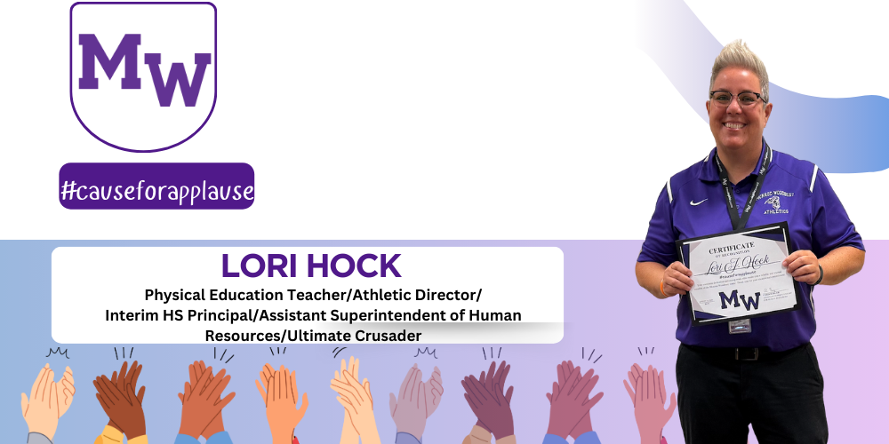 woman wearing a purple shirt holding a certificate with graphic of clapping hands