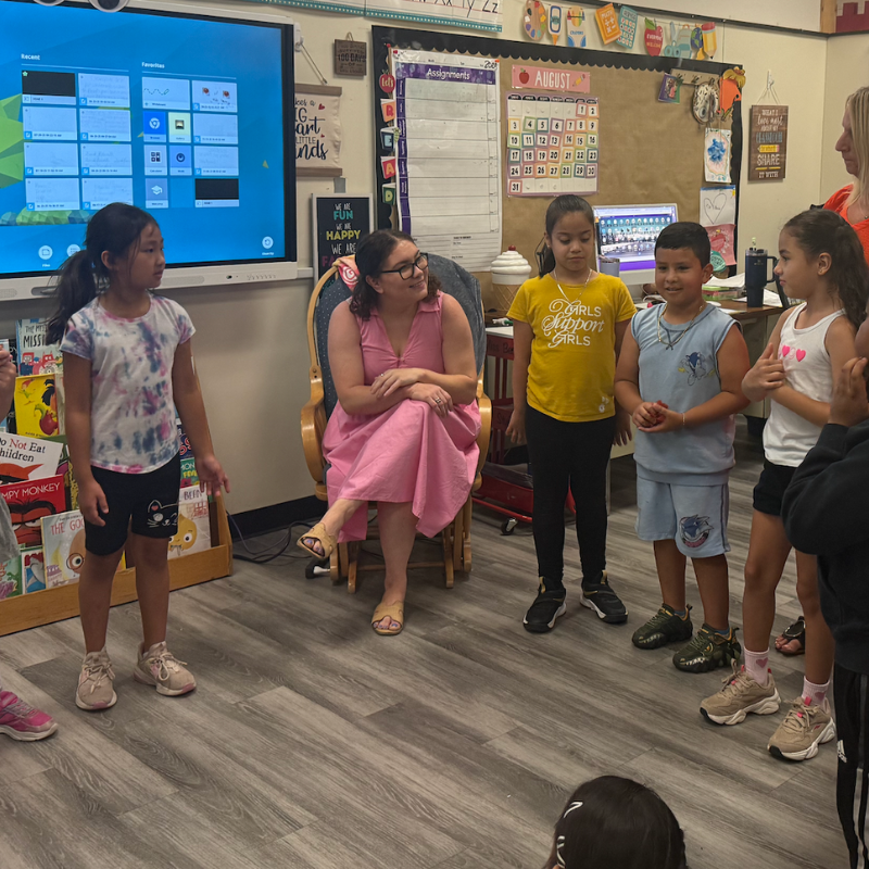 students standing in a classroom