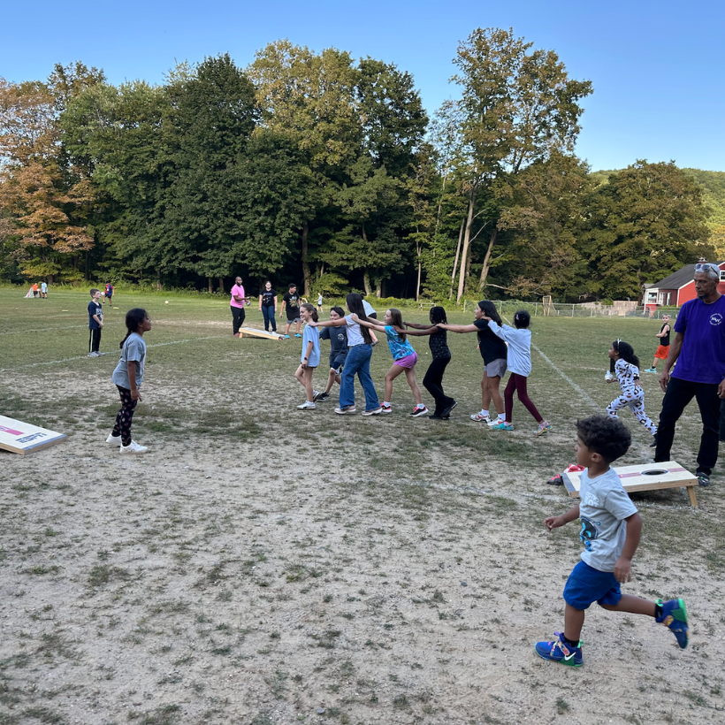 students playing games outside 