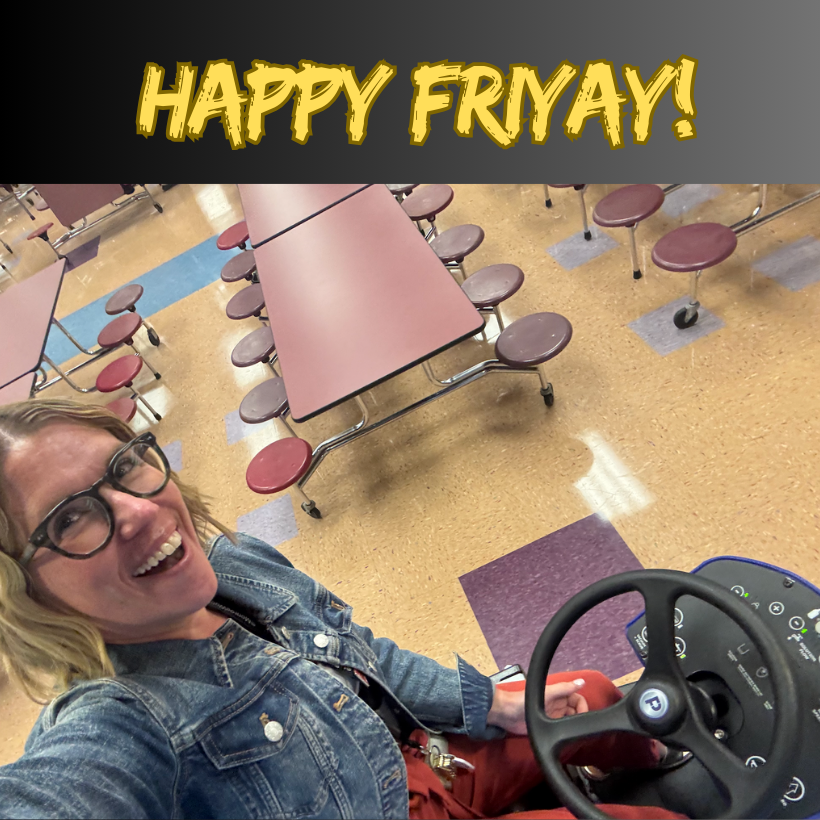 woman in a jean jacket with red pants riding a zamboni