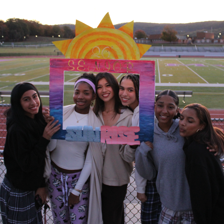 students with photo of the sun 