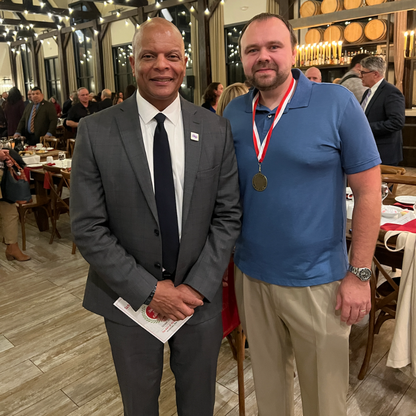 two people standing together 