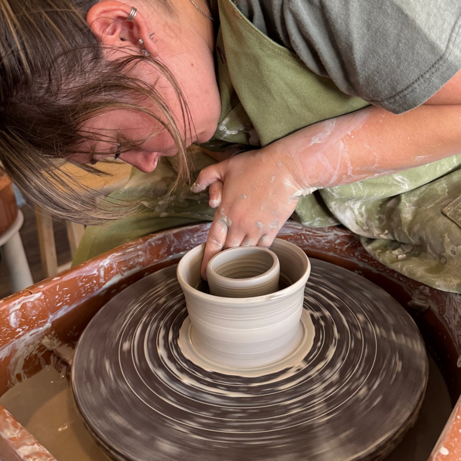 photo of woman making a bowl 