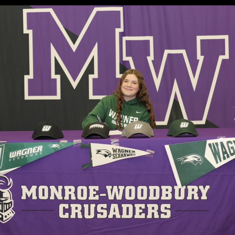 student signing letter of intent 