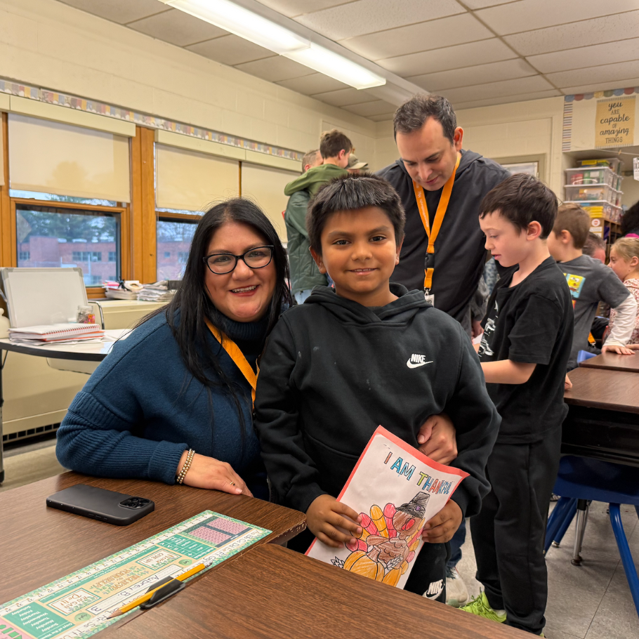 two people smiling at the camaera