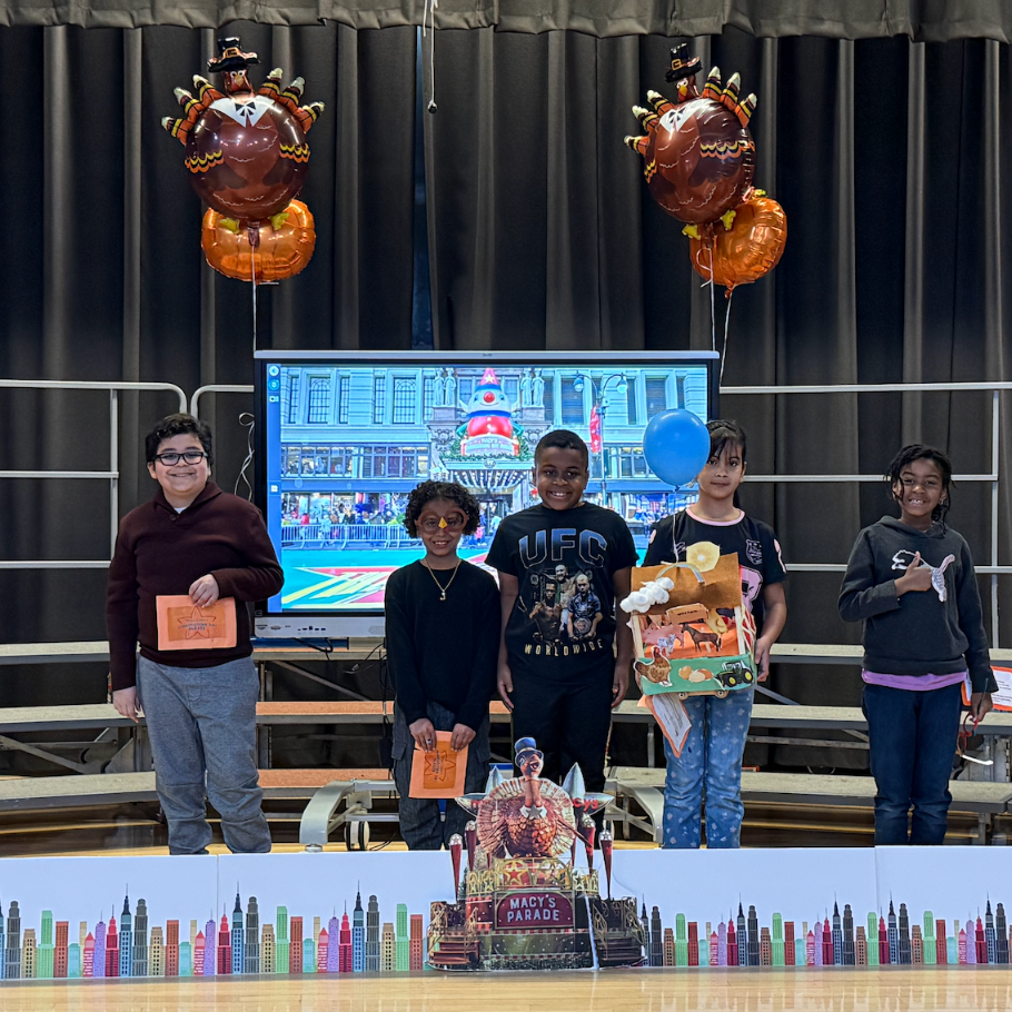 students standing on stage