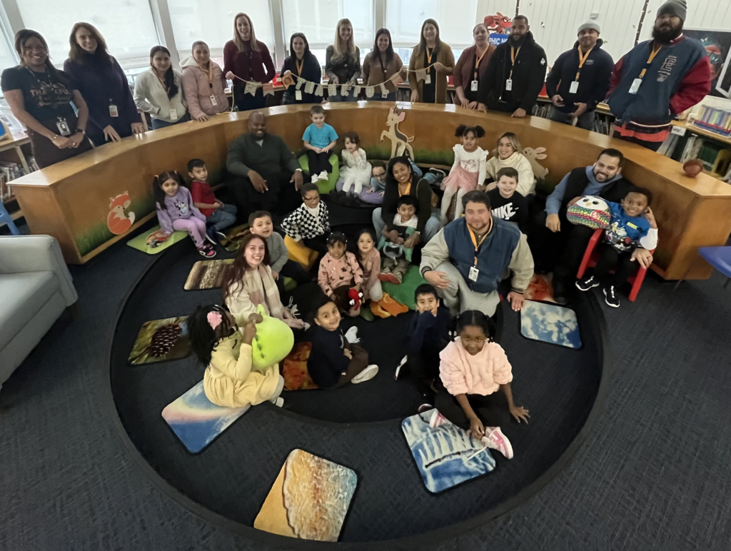Smith Clove students and their family members in the library