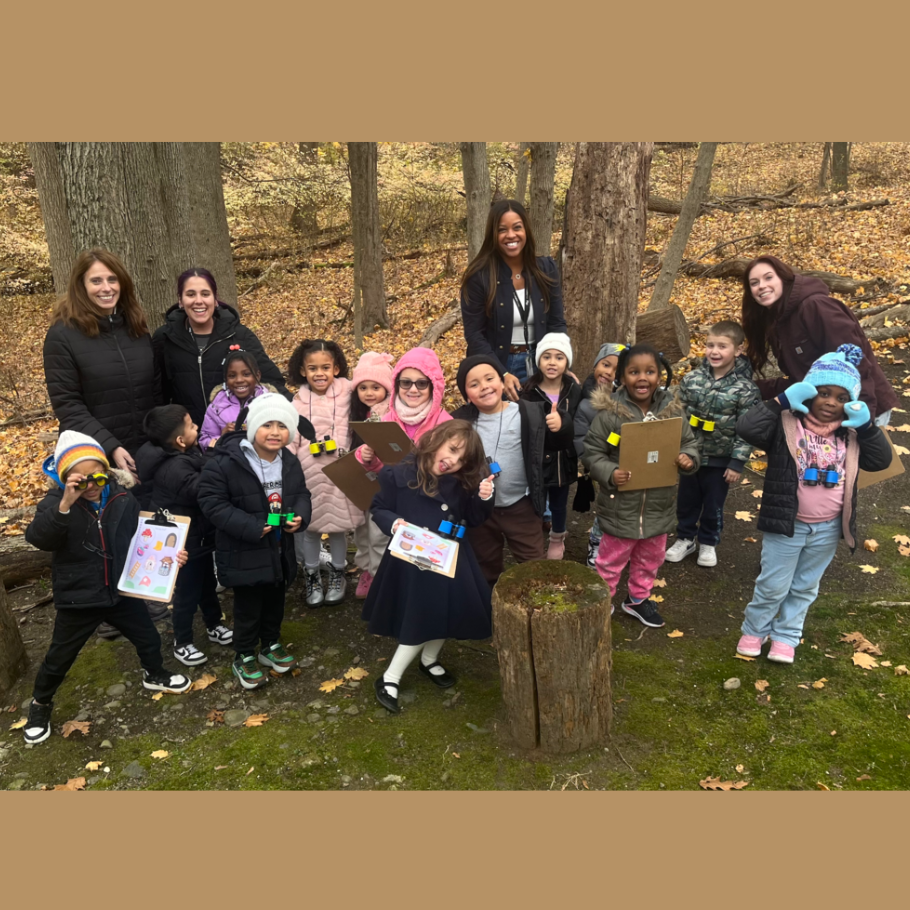 students standing outside in woods
