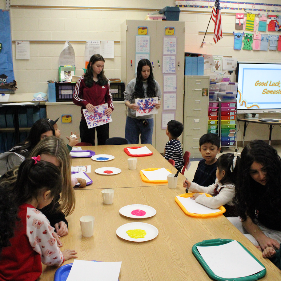 white plates with paint in the middle 