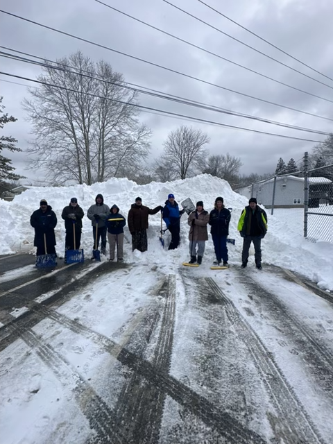 clean up crew shoveling