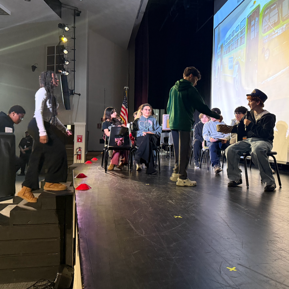 students walking on stage