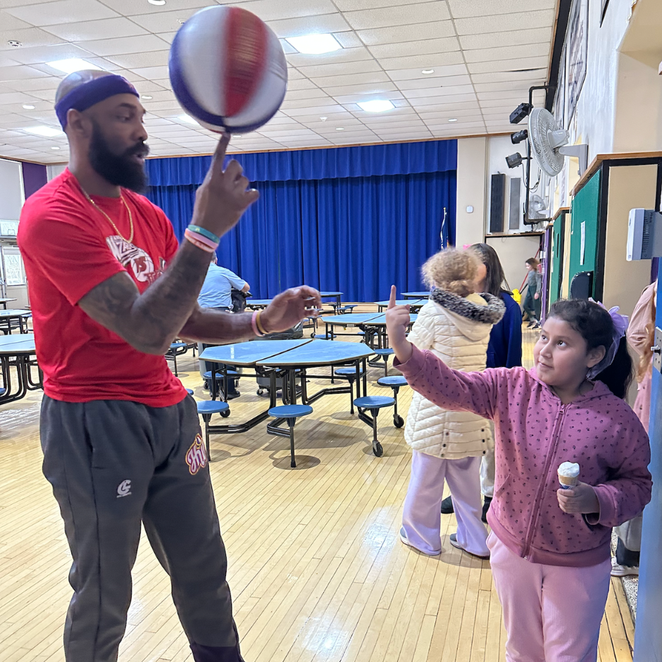 man spinning a basketball 