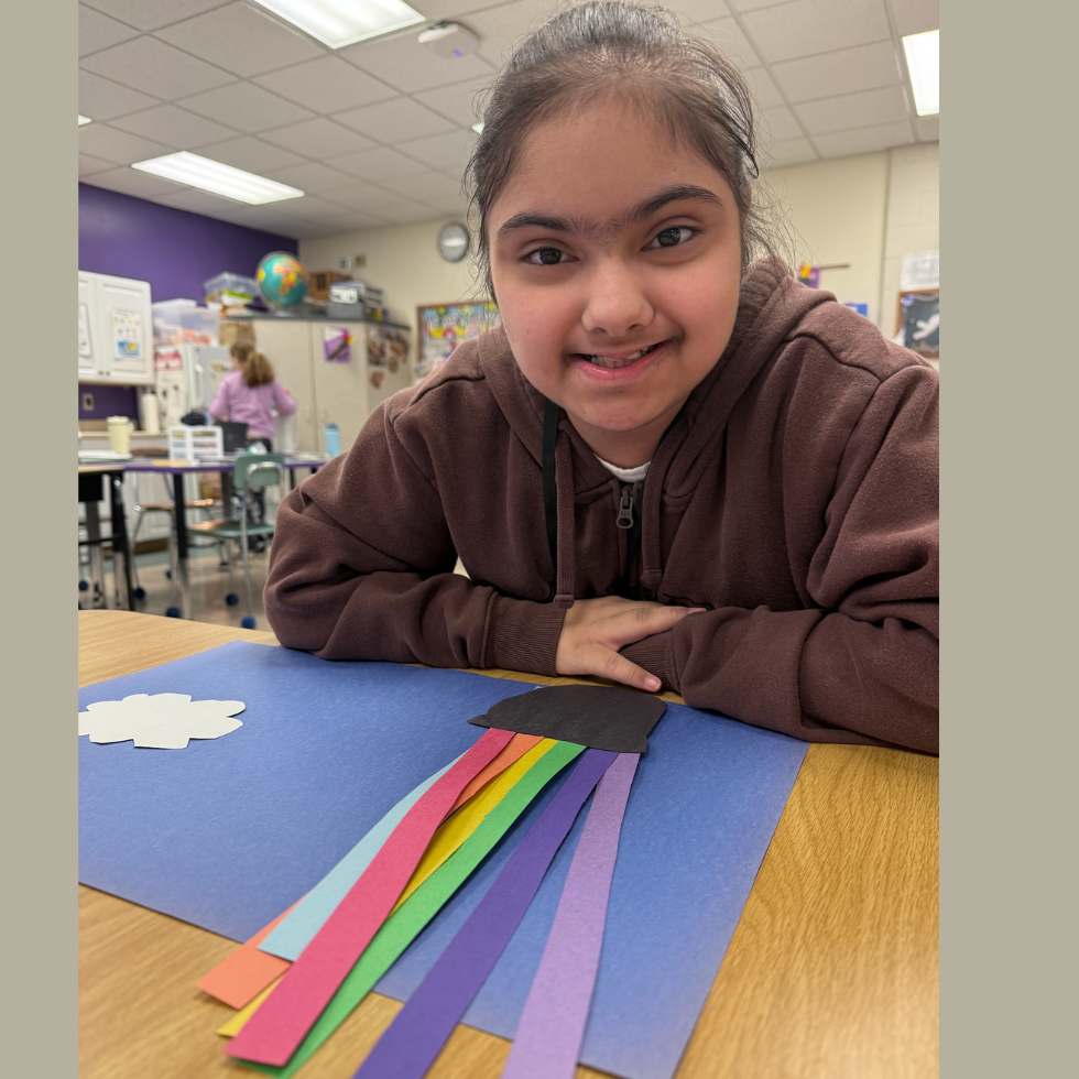 student sitting at a table 