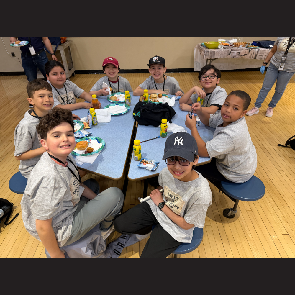 students sitting at table 