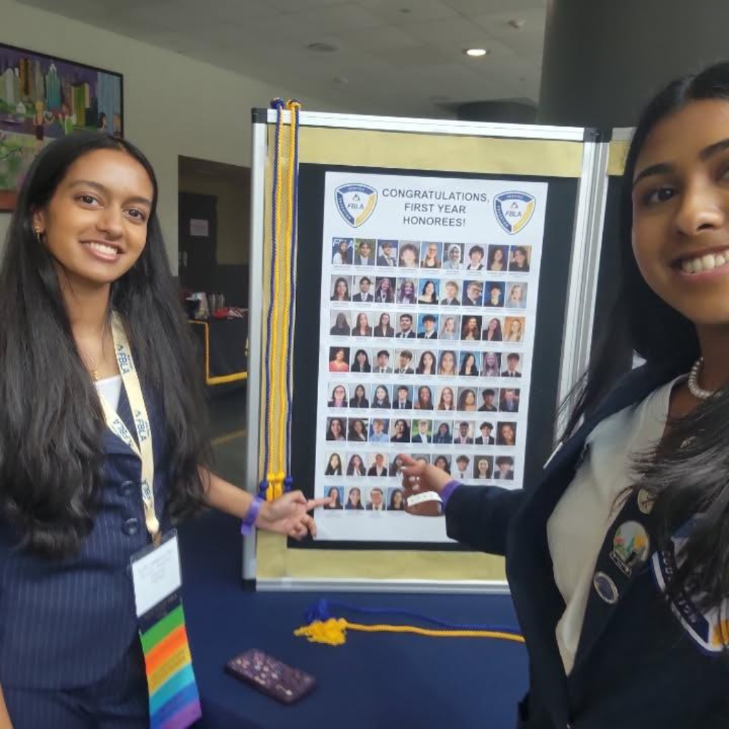 two students inducted into Honor Society