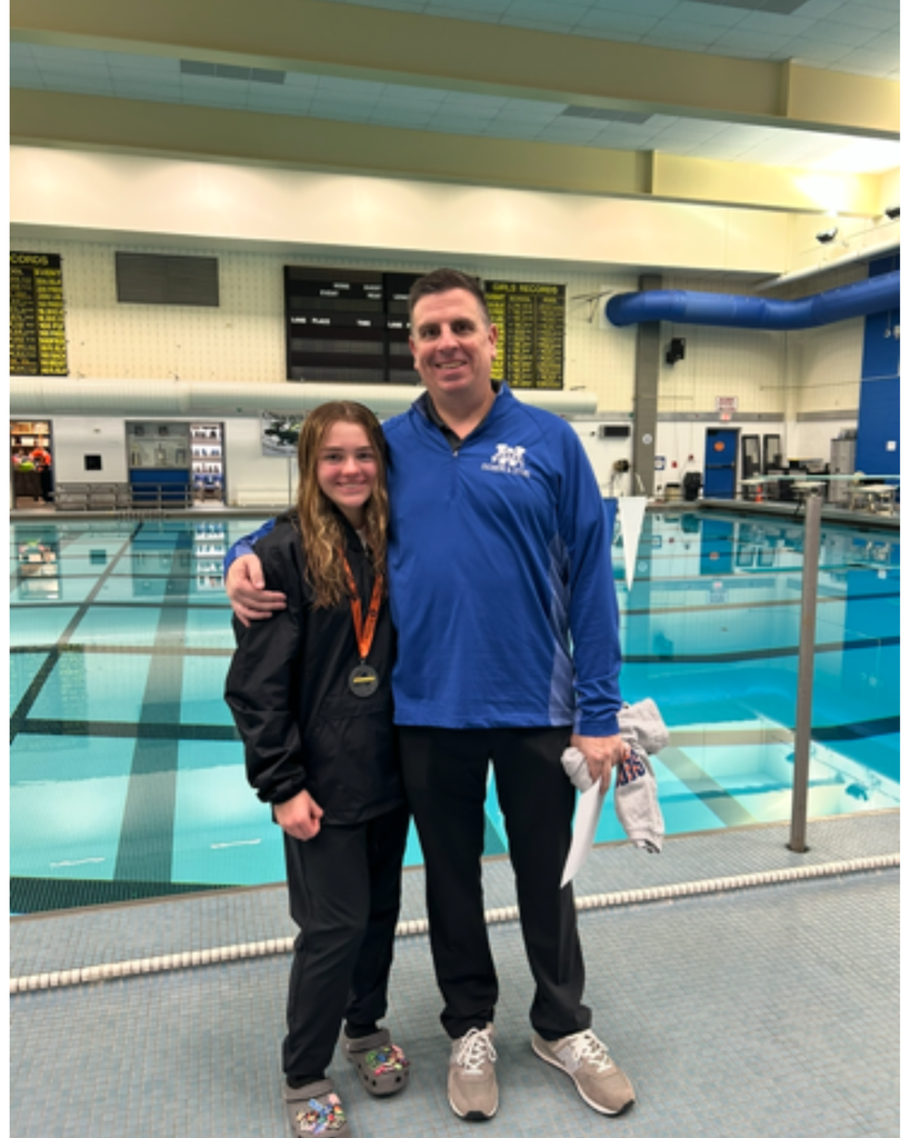 Molly with swimming coach