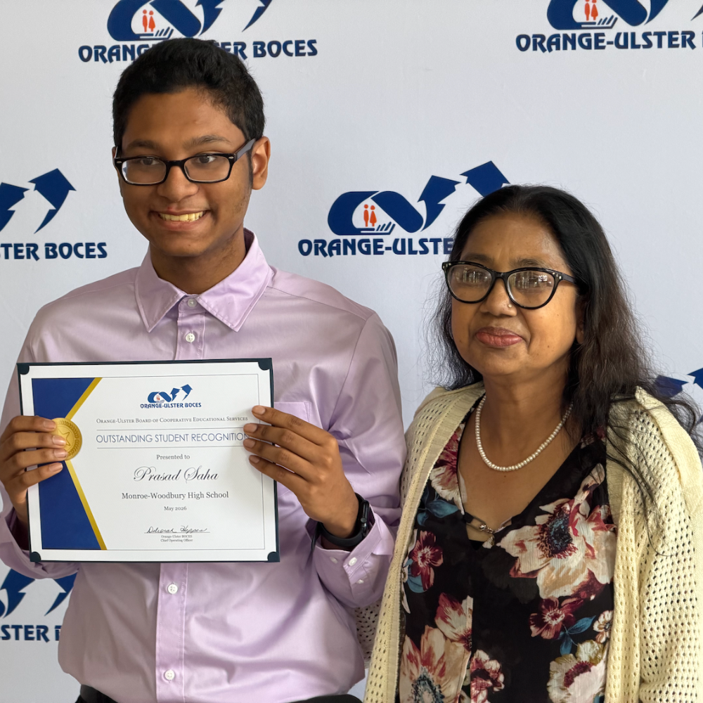 orange-ulster boces, student holding a certificate