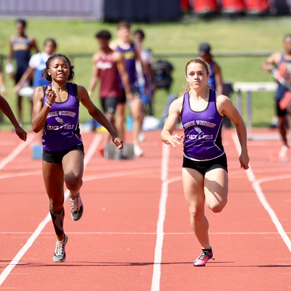 monroe-woodbury track and field, two students running