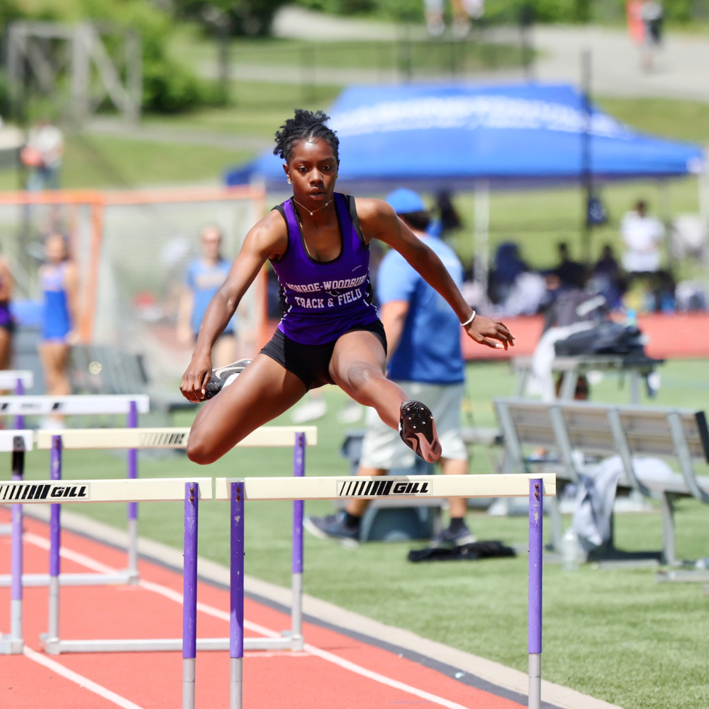 GILL - student jumping hurdle