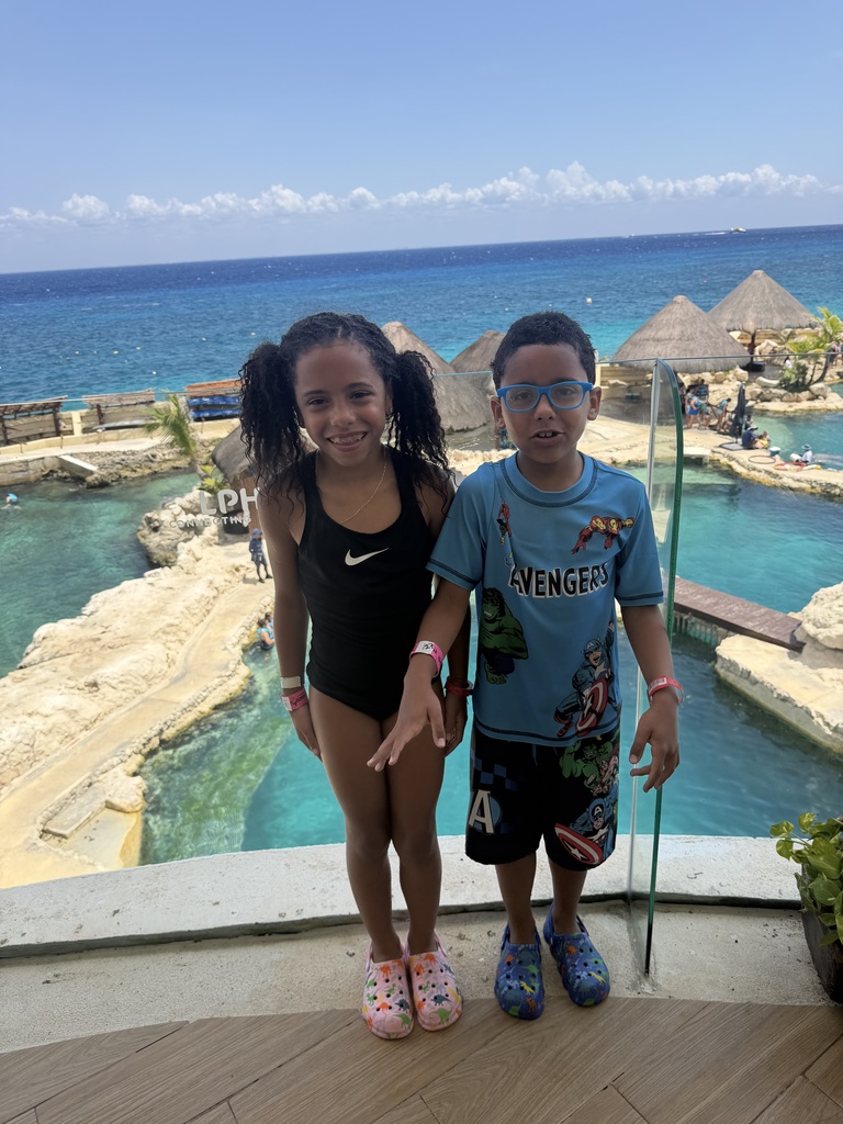 students in Mexico standing in front of pools