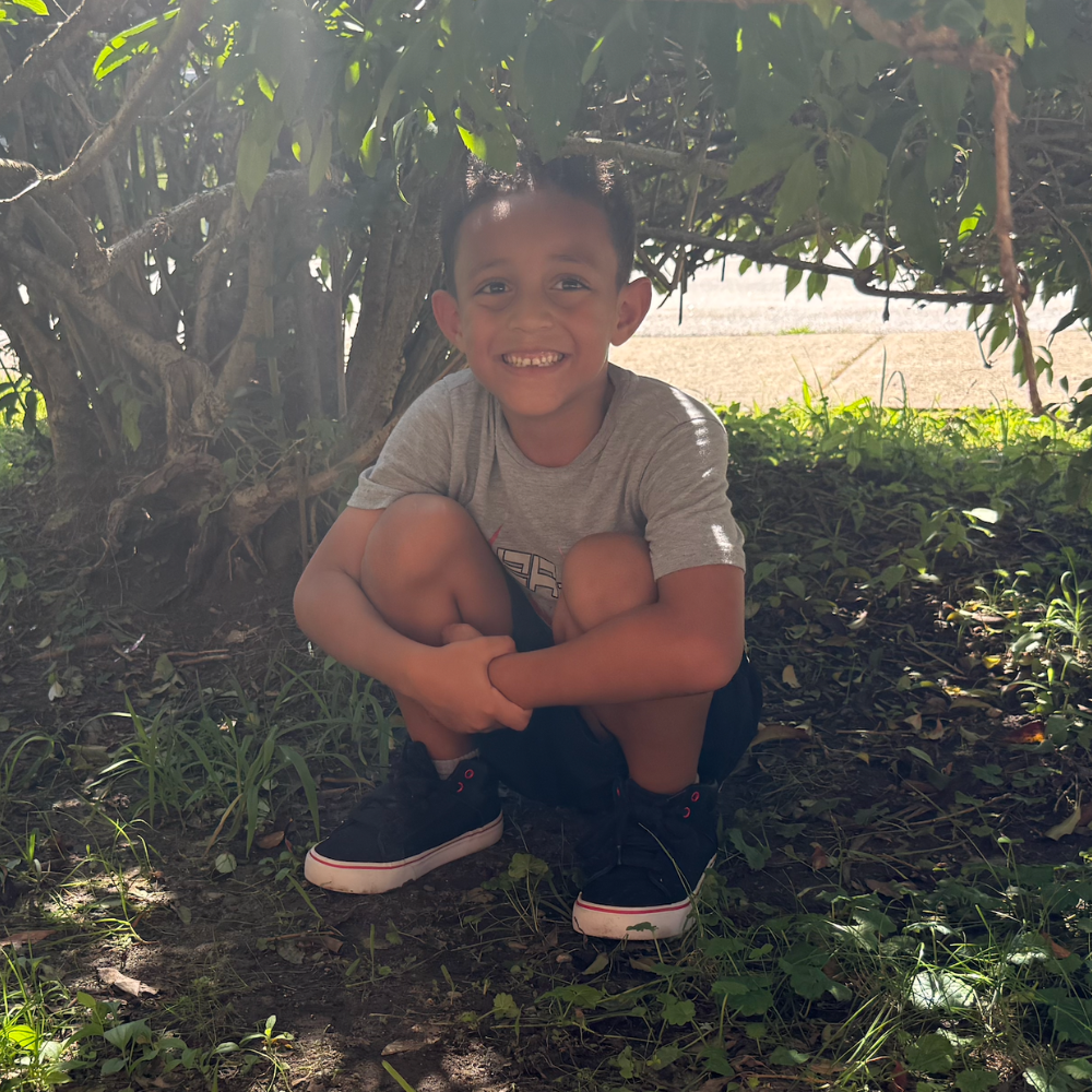 student under a tree