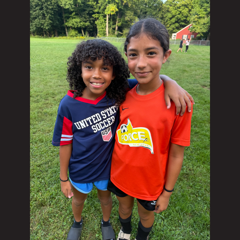 two students wearing soccer jerseys, United States Soccer