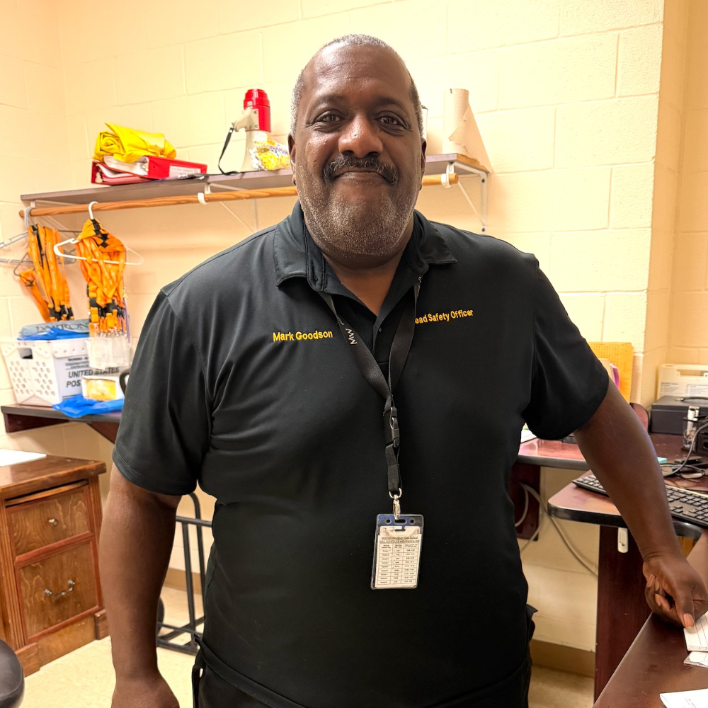 Man standing wearing a black shirt 