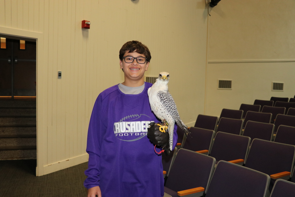 student with a falcon