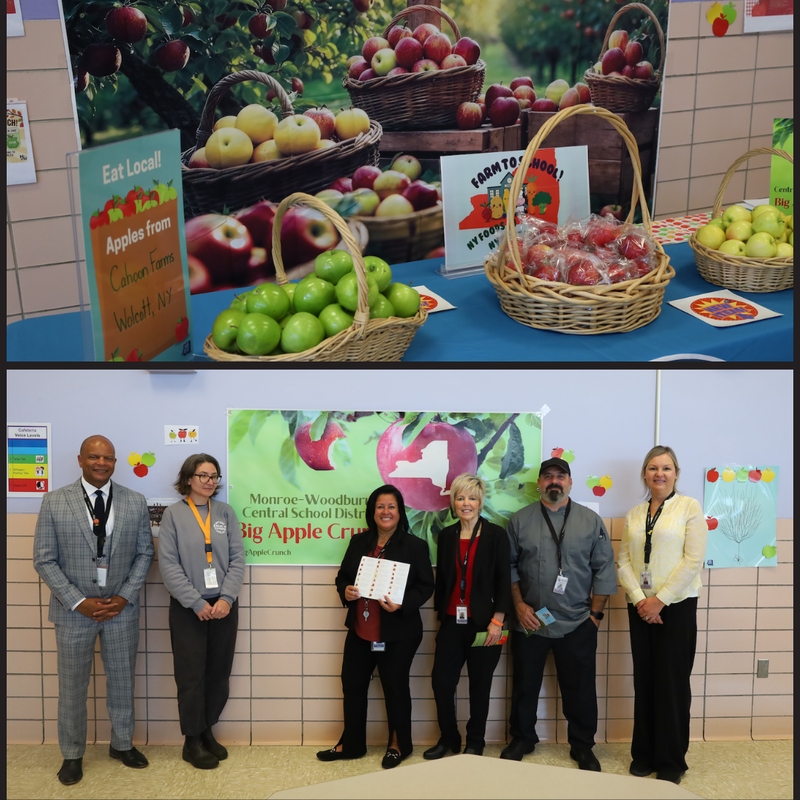 bushels of apples and six people standing in front of an apple bulletin board