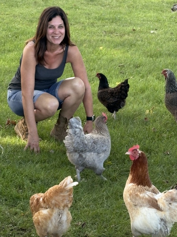 woman with chickens