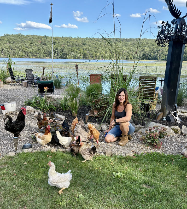 woman with chickens